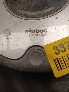 lot 33744 image: iRobot roomba vacuum with charging station
