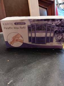 lot 33756 image: Pack of 4 paraffin wax refills