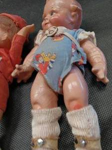 lot 33680 image: Set of three small vintage or antique miniature dolls