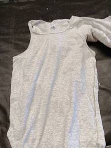 lot 33703 image: Augusta adults size small gray tank top - 5 pieces.
