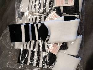 lot 33707 image: Bundle of Black and white striped long socks, size Large