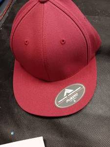 lot 33710 image: Bundle of Flexfit ballcaps, size XS in burgundy color - 12 Count.