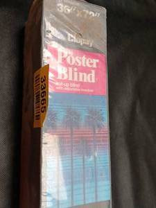 lot 33665 image: Clopay Poster Blind, roll-up window blind measuring 36 inches by 72 inches