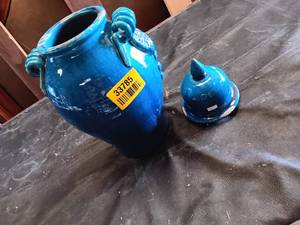 lot 33785 image: Glossy turquoise ceramic vessel with side handles and a matching lid, resembling an antique Chinese glazed jar