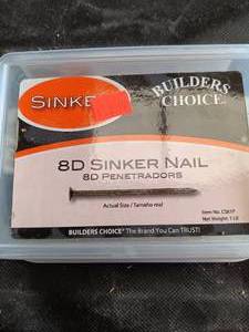 lot 33794 image: The image shows a box of Builders Choice 8D Sinker Nails, 2-38-inch vinyl-coated framing fasteners