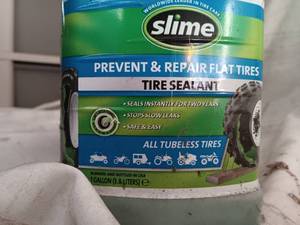 lot 33847 image: Bottle of Slime Prevent & Repair Tire Sealant