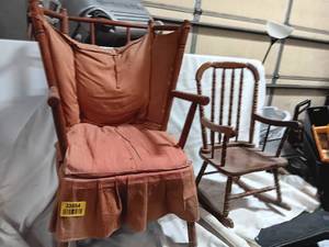 lot 33854 image: Vintage upholstered wingback Wooden chair with a pleated skirt and reddish-orange fabric, and childrens wooden rocking chair