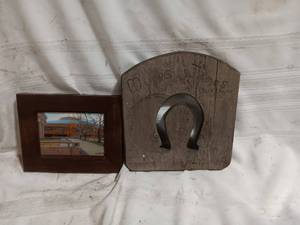 lot 33865 image: Rustic wooden plaque featuring a metal horseshoe accent and a companion photo frame with a western style.