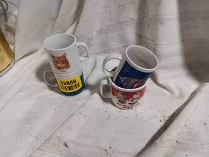 lot 33885 image: Set of 4 Coffee Cups with various designs