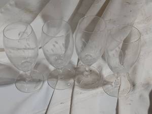 lot 33886 image: Clear stemmed glassware, crystal winecordial glasses with a paneled or multi-sided stem design.