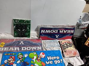 lot 33896 image: Collection of items, including a blue Super Mario Here we go sign, a Black Panther canvas, and sportsdecor signs