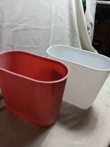 lot 33935 image: 2 Small White & Pink Trash Cans.