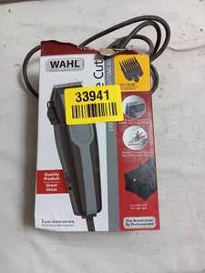 lot 33941 image: Set of 2 Wahl Hair Clippers With Attachments.