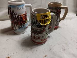 lot 33946 image: Vintage Budweiser Holiday Beer Steins.