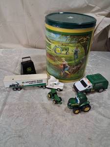 lot 76 image: John Deere Moline Illinois Decorative Tin Container with Toy Vehicles Lot