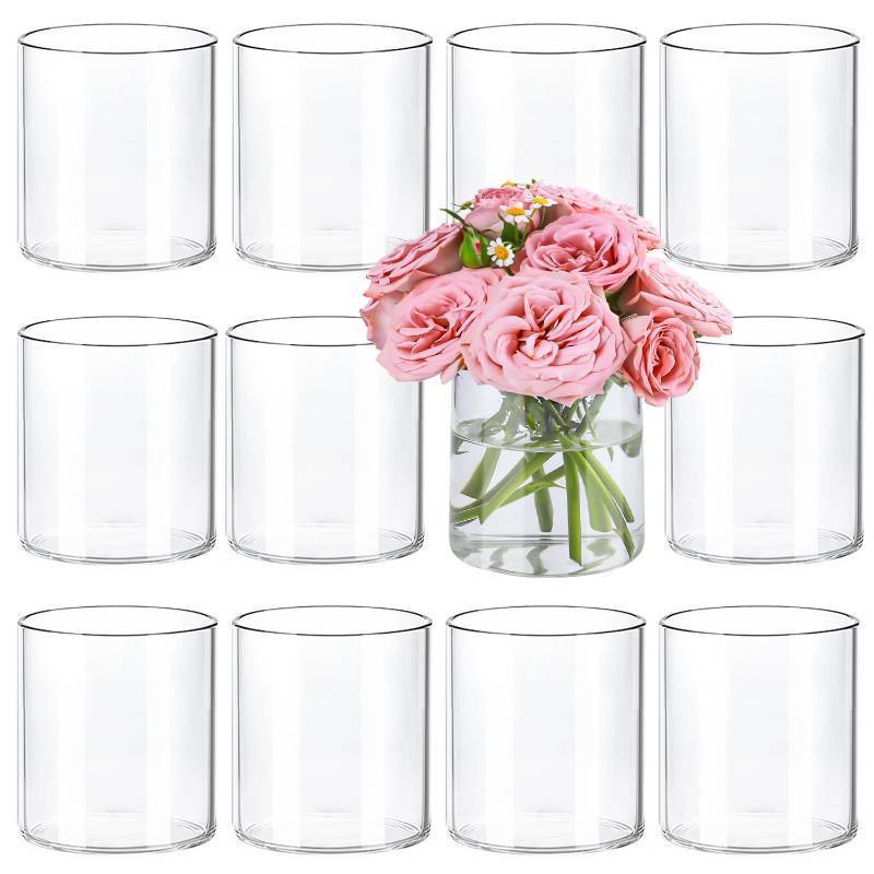 lot 64017 image: 12pcs Small Glass Cylinder Vases for Centerpieces, 4 Inch Clear Flowers Vase for Wedding Decorations, Glass Hurricane Candle Holder for Home Decor Table Centerpiece. 2 MISSING. - Retail $30