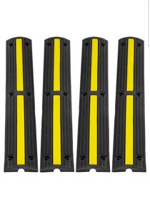 lot 18439 image: VEVOR 3.28 ft Cable Protector Ramp, 4 Pack of 1 Channel, 18000 lbsaxle Capacity Heavy Duty Rubber Speed Bumps, Floor Cord Cable Protector Wire Cover, for Residential Areas, Private Garages, Gardens - Retail $0