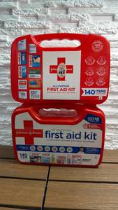lot 31 image: Lot of 2 first aid containers, with some accessories