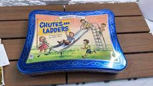 lot 49 image: Chutes and Ladders Board Game with Spinner and Game Pieces