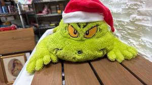 lot 120 image: Grinch Plush Toy with Santa Hat (18 inches)