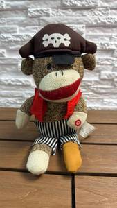 lot 137 image: Gemmy Monkey Town USA Animated Sock Monkey Pirate Plush Toy with Hat and Red Scarf