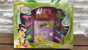 lot 151 image: Disney Fairies Diary Gift Tote with Glitter Glues, Gel Pens, Stamps and Stickers