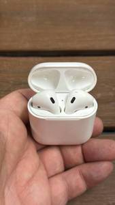 lot 159 image: Apple AirPods Wireless Earbuds with Charging Case