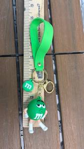 lot 262 image: M&Ms Green Character Keychain with Lanyard