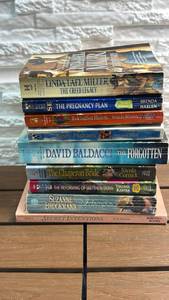lot 311 image: Lot of 9 Paperback Novels