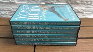 lot 316 image: Yoga Burn Monthly 24-DVD Set