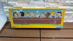 lot 333 image: Aquarius Peanuts 1000 Piece Jigsaw Puzzle 12in x 36in