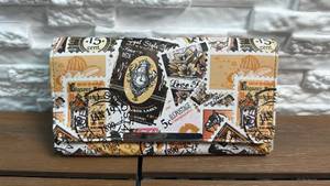 lot 342 image: Wallet with Vintage Postage Stamp and Floral Print Pattern
