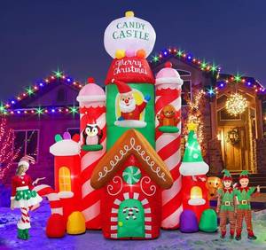 lot 3566 image: $87 Flash Light 10ft Christmas Inflatable Candy Castle with Santa