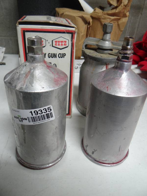 lot 19335 image: Lot of 4 spray gun cups.