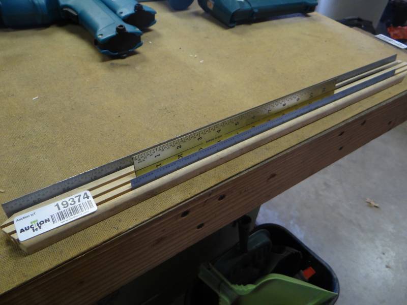 lot 19374 image: Ruler stand wrulers.