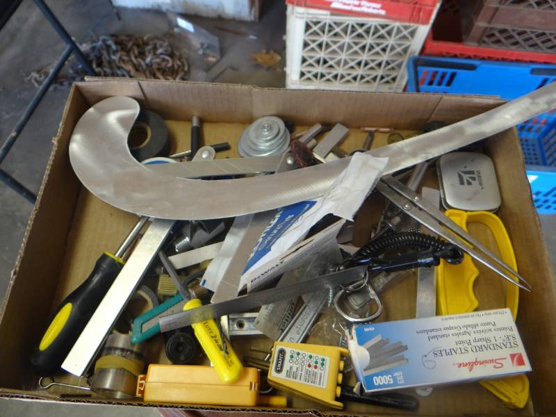 lot 19492 image: Lot of staples, tape, various bits, squares, & more.