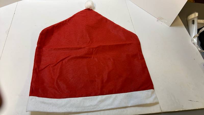 lot 168209 image: Santa Hat with White Trim Christmas Party Table Decor - Retail $5