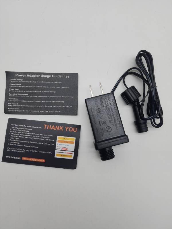 lot 69377 image: AC Power Adapter with Usage Guidelines - Retail $12