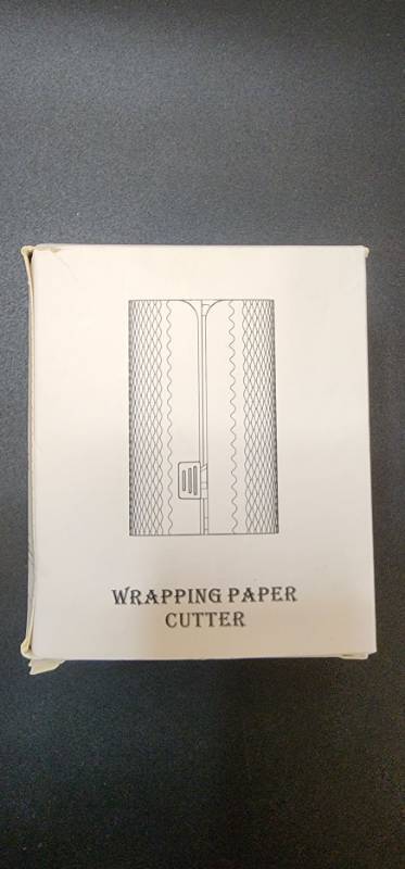 lot 70626 image: Turquoise Wrapping Paper Cutter Tool - Retail $12