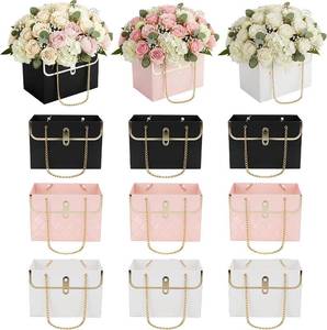 lot 79036 image: 12 Pack Flower Paper Gift Bag, Bouquet Storage Bucket Box Paper Flower Handbag Box with Metal Chain Rectangle Mothers Day Flower Bags for Bouquets Wedding Flower Graduation Supplies, Black White Pink