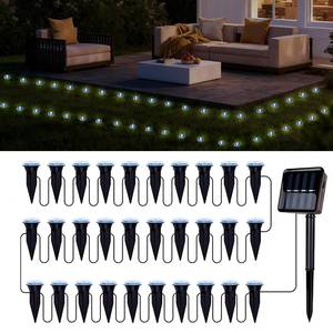 lot 29150 image: 30 LED Solar Ground Lights Outdoor, Waterproof Solar Pathway Lights, LED Landscape Lighting for Garden, Patio, Driveway, Walkway - White, VISIBLE USE. - Retail $20
