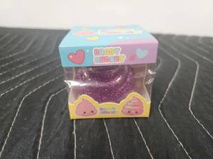 lot 63858 image: Baby Budgie Glitter Sensory Toy with Pink Poop Character