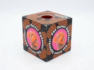 lot 63902 image: Nee Don Fuzz Ball Sensory Squeeze Toy Orange