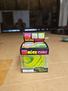 lot 63967 image: NeeDoh Nice Cube Sensory Toy - GreenYellow Swirl