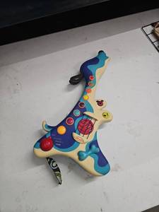 lot 62820 image: B. toys Woofer Interactive Dog Guitar