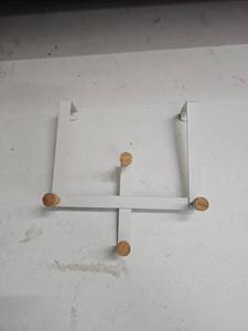 lot 62847 image: white metal over-the-door rack