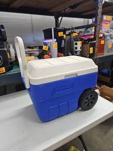 lot 62909 image: Coleman 56-Quart Wheeled Cooler