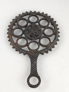 lot 167 image: Antique Black Cast Iron Trivet Flatiron Star & Circles