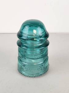 lot 26 image: Hemingray Glass Insulator Turquoise Threadless