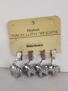 lot 308 image: World Market Elephant Tablecloth Weights Set of 4